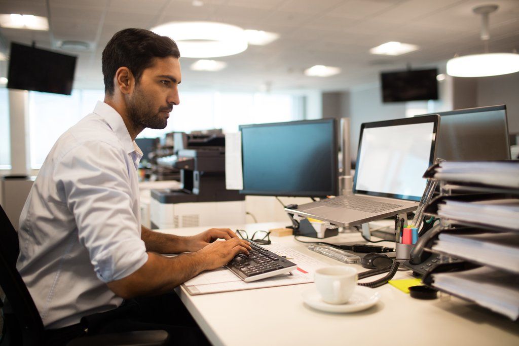 Businessman Working on Computer